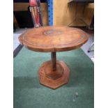A WOODEN SIDE TABLE