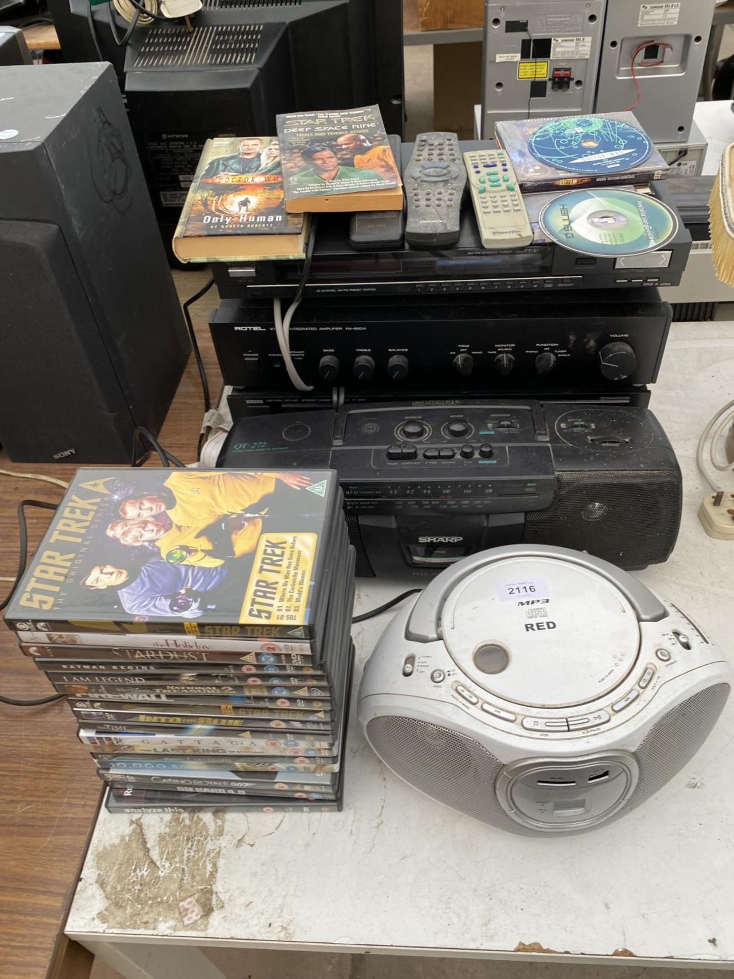 AN ASSORTMENT OF ITEMS TO INCLUDE A SHARP RADIO, A CD PLAYER AND A ROTEL STEREO INTERGRATED