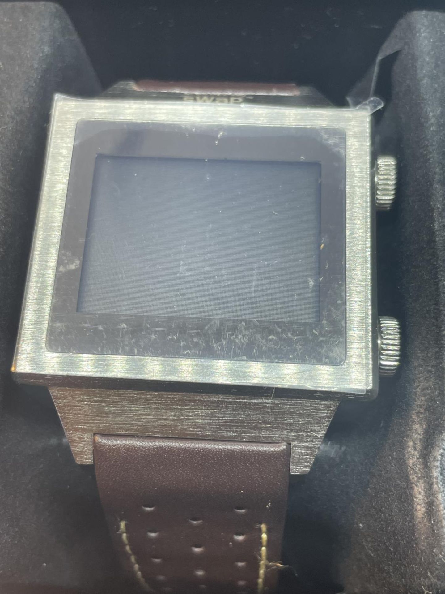 A SWAP SMART WATCH IN PRESENTATION TIN AND BOX - Image 2 of 3