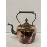 A HEAVY COPPER KETTLE WITH AN ACORN FINIAL