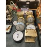 A QUANTITY OF VINTAGE CLOCKS TO INCLUDE CARRIAGE AND ALARM CLOCKS PLUS VINTAGE TINS AND METERS