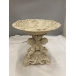 A VINTAGE STYLE TAZA DISH WITH CHERUBS ON THE PEDESTAL BASE AND CLASSICAL DECORATION