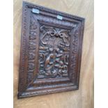 A VINTAGE OAK CARVED PANEL