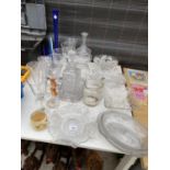 AN ASSORTMENT OF GLASS WARE TO INCLUDE A DECANTOR, WINE GLASSES AND DISHES ETC