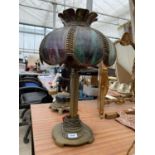 A VINTAGE BRASS TABLE LAMP WITH METAL AND GLASS SHADE