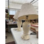 A PAIR OF CREAM CERAMIC TABLE LAMPS WITH SHADES