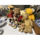 A LARGE QUANTITY OF VINTAGE TEDDY BEARS TO INCLUDE RUPERT THE BEAR, BASIL BRUSH, ETC