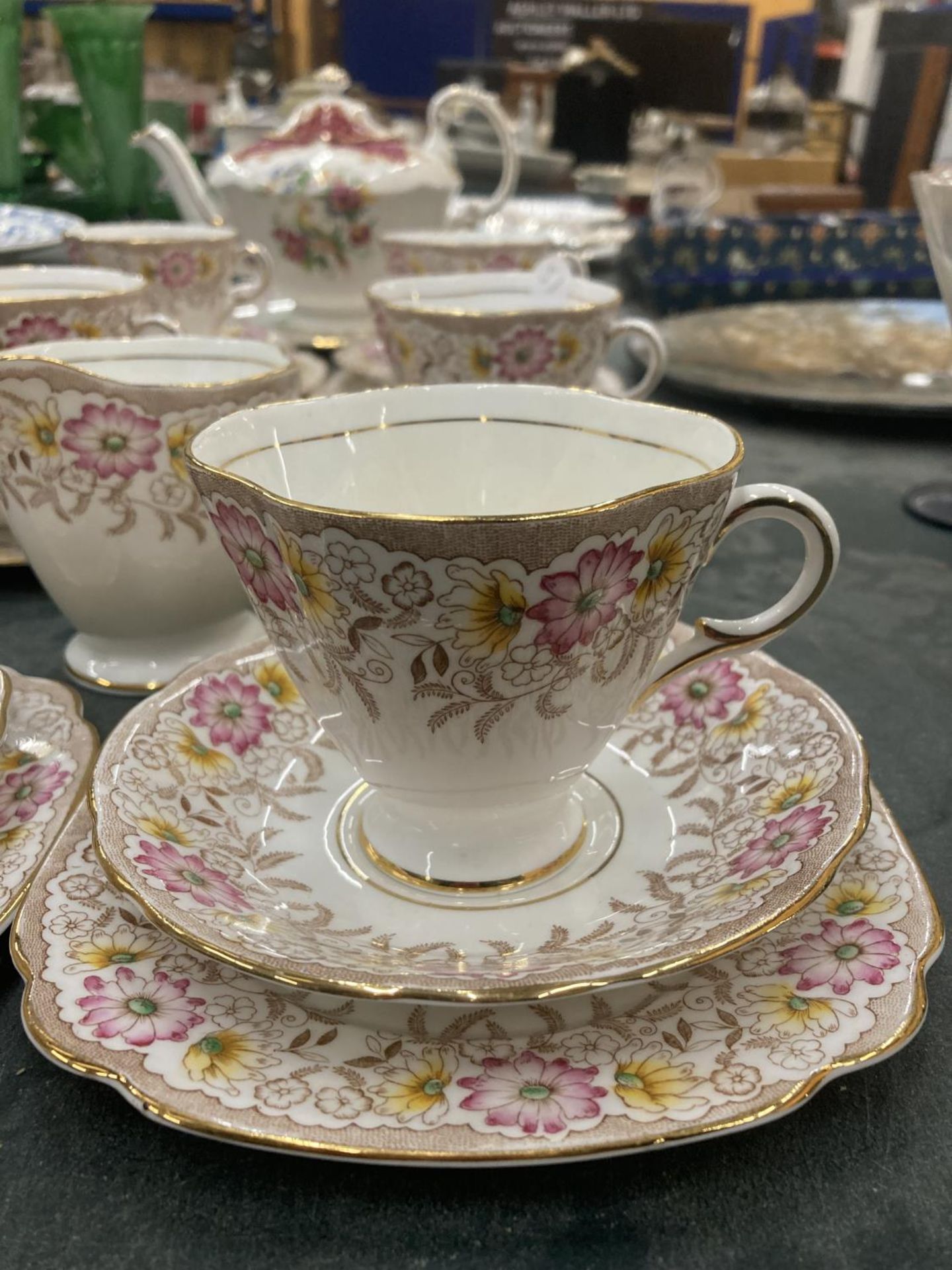 A WINDSOR SET OF SIX TRIOS,CAKE PLATE AND A CREAM JUG IN A FLORAL PATTERN PLUS A PARAGON 'BIRD OF - Image 2 of 7