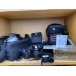 AN ASSORTMENT OF CAMERA EQUIPMENT TO INCLUDE A RICOH KR-10 CAMERA, A POLAROID CAMERA AND A SET OF