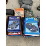 A LARGE COLLECTION OF HAYNES CAR MANUALS