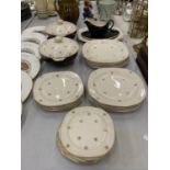A QUANTITY OF ALFRED MEAKIN 'MIDNIGHT STAR' DINNERWARE TO INCLUDE TWO TUREENS, SERVING PLATE, DINNER