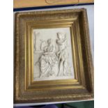 A HAEVY CARVED PLAQUE OF GREEK GODDESSES IN AN ORNATE GILT FRAMED 67CM X 58CM