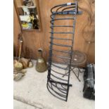 A LARGE BLACK PAINTED WROUGHT IRON HAYRACK