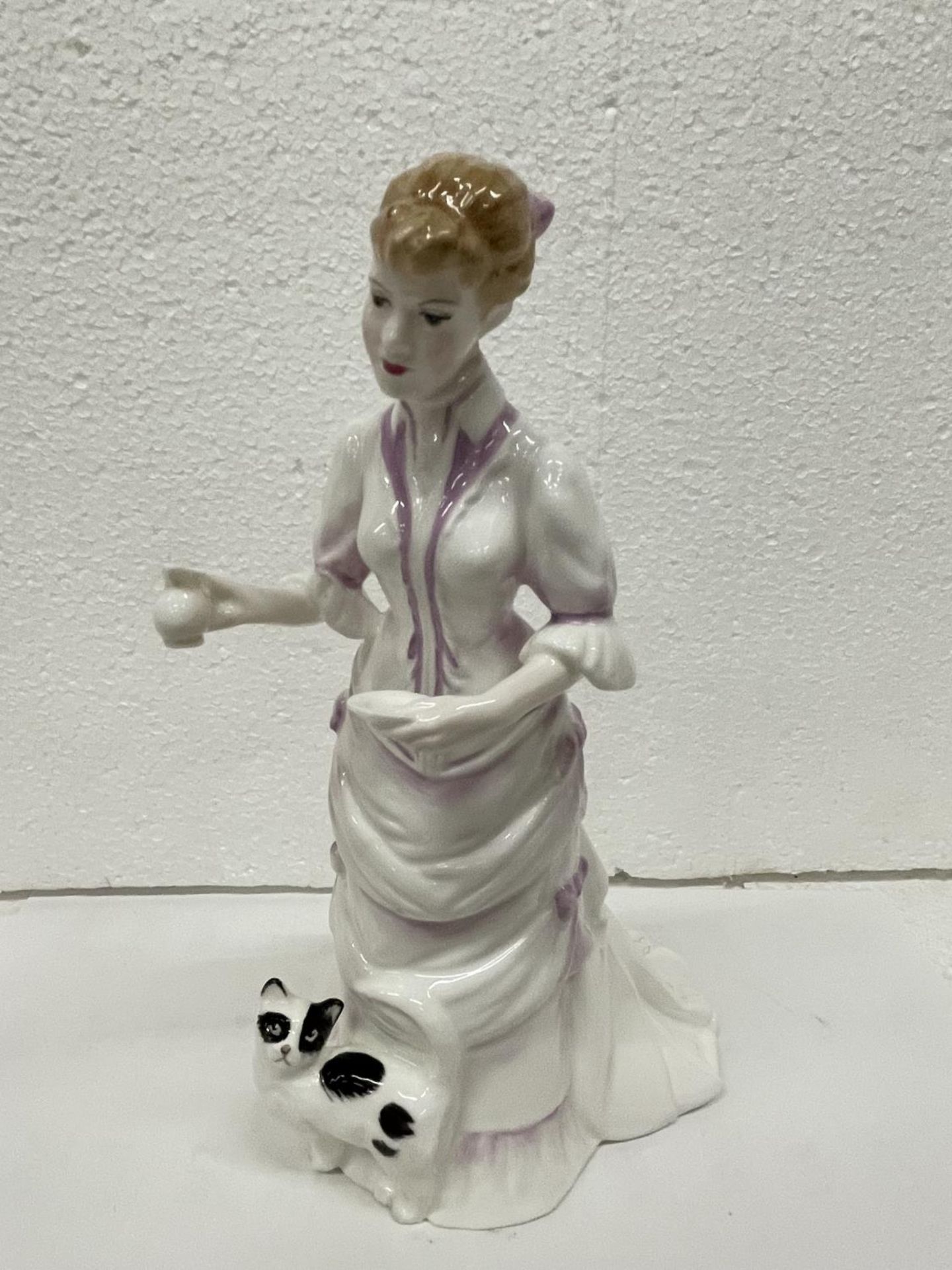 A ROYAL DOULTON FIGURE LUCY HN 3858