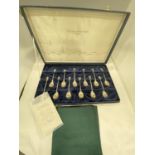 A SET OF TWELVE STERLING SILVER AND SILVER GILT LIMITED EDITION FOR YEAR 1979 ASTROLOGICAL SPOONS IN