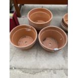 FOUR LARGE TERRACOTTA PLANT POTS