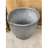 A VINTAGE GALVANISED DOLLY TUB WITH SOAP TRAY