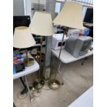 A PAIR OF MODERN METALWARE ADJUSTABLE READING LAMPS AND A TABLE LAMP