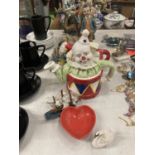 A QUANTITY OF ITEMS TO INCLUDE A CLOWN AND DRAGON TEAPOT, CLOWNS, PARROTS, CHICKENS, A DRAGON, ETC