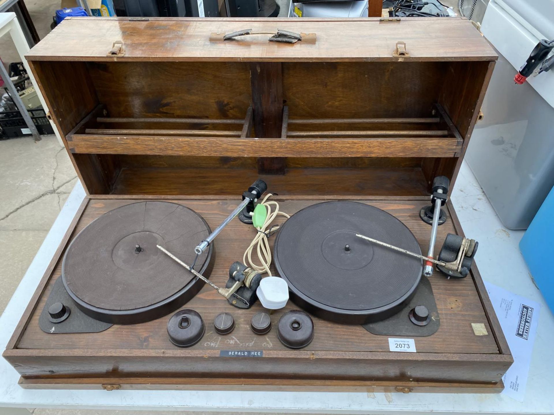 A WOODEN CASED VINTAGE RECORD PLAYER
