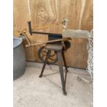 A VINTAGE SCROLL SAW WITH TRIPOD BASE