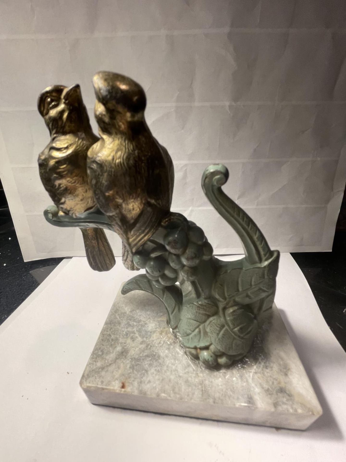 TWO BRONZED BIRDS ON A MARBLE BASE