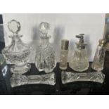 SEVEN ITEMS IF CUT GLASS TO INCLUDE PERFUME BOTTLES, PEPPER POT ETC (PERFUME BOTTLE AND PEPPER POT