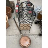 A TWENTY BOTTLE WINE RACK AND A COPPER BED WARMING PAN