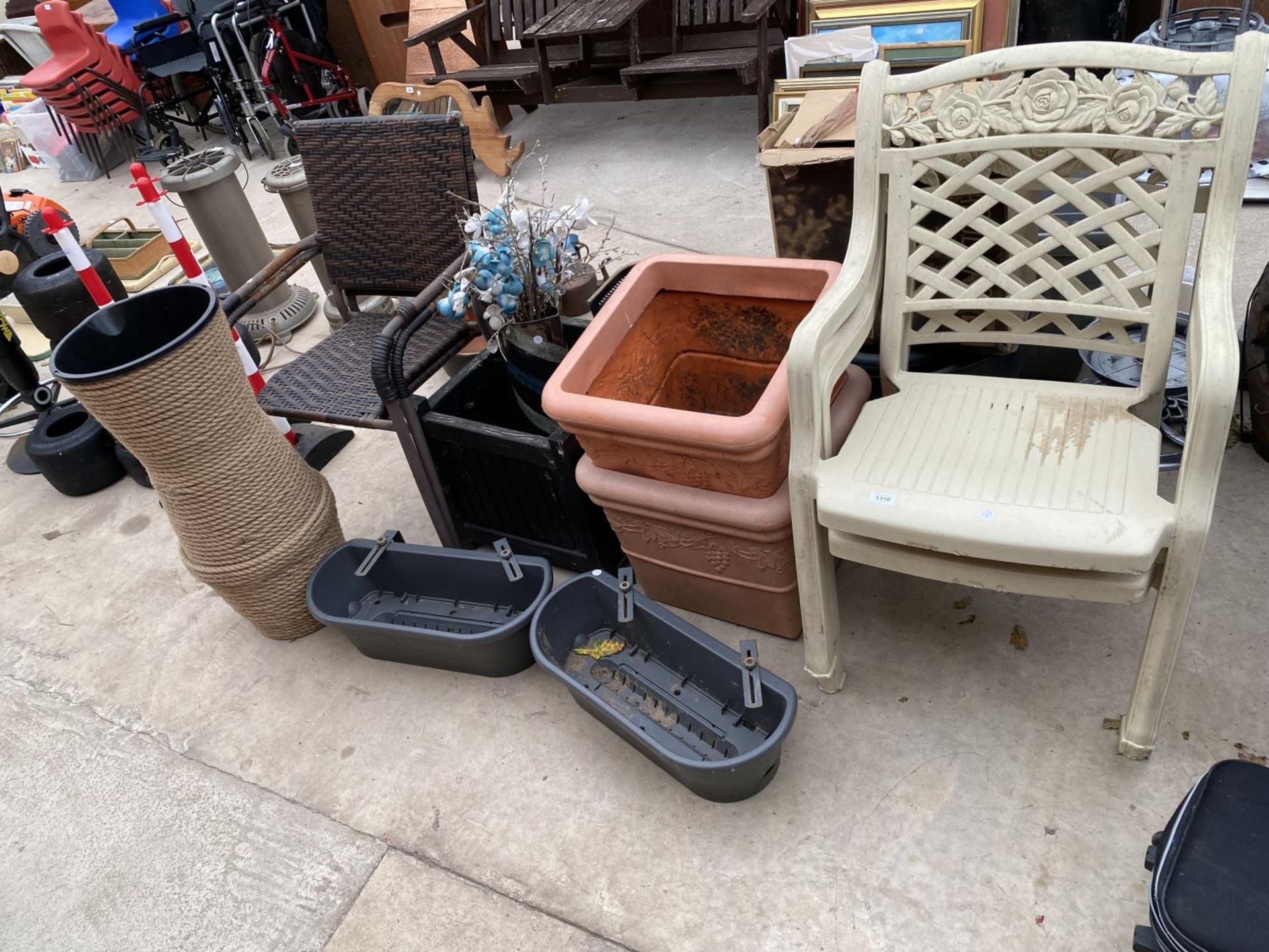 AN ASSORTMENT OF GARDEN ITEMS TO INCLUDE STACKING CHAIRS, PLANTERS AND PLASTIC WINDOW BOXES ETC