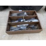 A VINTAGE WOODEN THREE SECTION STORAGE TRAY AND A LARGE QUANTITY OF FLATWARE
