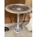 A VINTAGE CAST IRON BIRD BATH