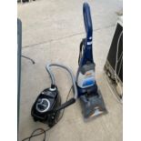 A VAX RAPIDE CARPET CLEANER AND A BOSCH HOOVER