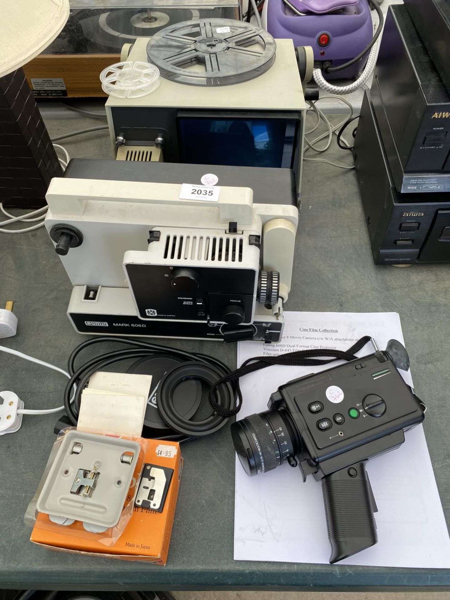 AN ASSORTMENT OF ITEMS TO INCLUDE A EUMIG PROJECTOR, A EUMIG CAMERA AND A TV ETC