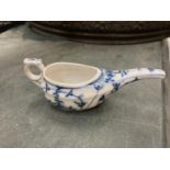 AN ORIENTAL BLUE AND WHITE DRINKING VESSEL