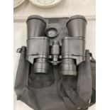 A PAIR OF FIELD BINOCULARS IN A CASE