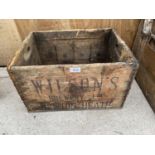 A VINTAGE MONOGRAMED 'WILSONS BREWERY' WOODEN CRATE