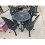 A DECORATIVE CAST ALLOY GARDEN BISTRO SET TO INCLUDE A TABLE AND FOUR CHAIRS