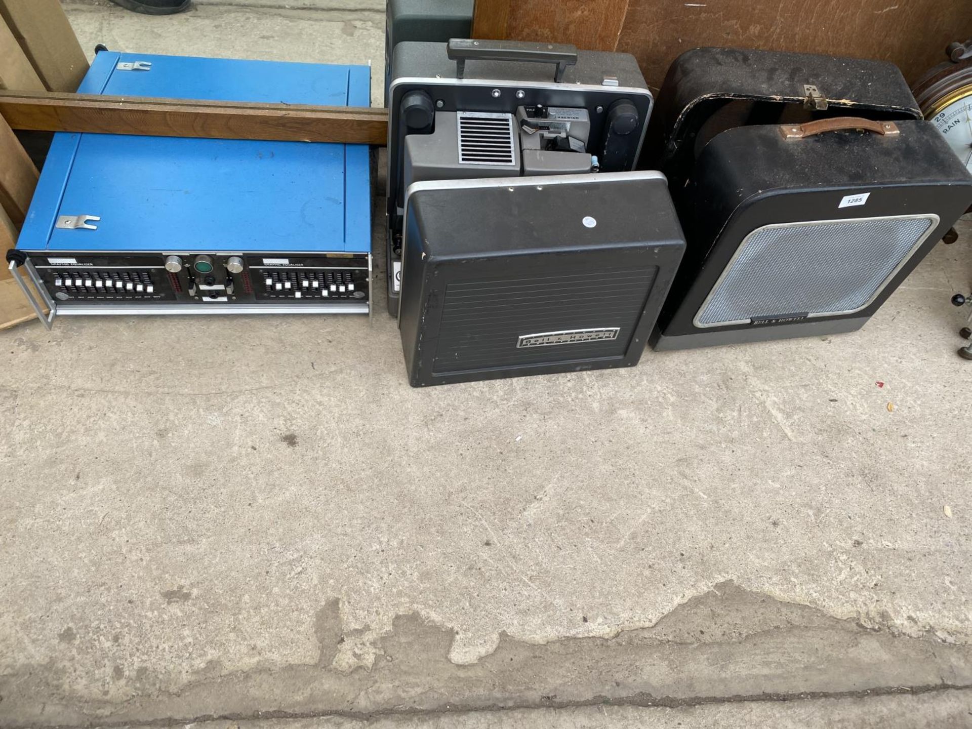 A BELL AND HOWELL CASED SPEAKER, A BELL AND HOWELL FILMOSOUND PROJECTOR AND A GRAPHIC EQUALISER ETC