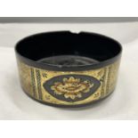 A BELIEVED ENGLISH REGENCY CIRCA 19TH CENTURY WINE COASTERS IN BLACK LACQUER WITH GILT DECORATION (