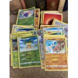 A BUNDLE OF OVER 200 POKEMON CARDS TO INCLUDE HOLO'S AND RARES