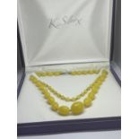 A VINTAGE DOUBLE STRAND BUTTERSCOTCH AMBER NECKLACE IN A PRESENTATION BOX