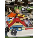 A QUANTITY OF VINTAGE TOYS TO INCLUDE FISHER PRICE, VHS VIDEOS, A DOLL, SOFT TOY, ETC