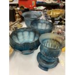 FOUR LARGE PIECES OF BLUE CLOUD GLASSWARE TO INCLUDE BOWLS AND PLANTERS