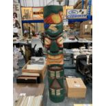 A WOODEN 'TIKI' STATUE HEIGHT 61CM