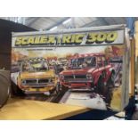A VINTAGE BOXED SCALEXTRIC 300 WITH MINI CARS - CANNOT GUARANTEE COMPLETE