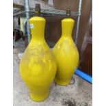 A PAIR OF VIVID YELLOW CERAMIC TABLE LAMPS