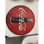 A CAST COCA COLA SIGN