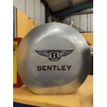A SILVER COLOURED BENTLEY PETRIL CAN WITH BRASS STOPPER