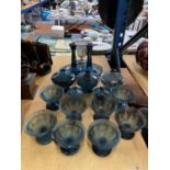 A LARGE QUANTITY OF BLUE CLOUD GLASSWARE TO INCLUDE DESSERT BOWLS, CANDLESTICKS, LIDDED BOWLS, ETC