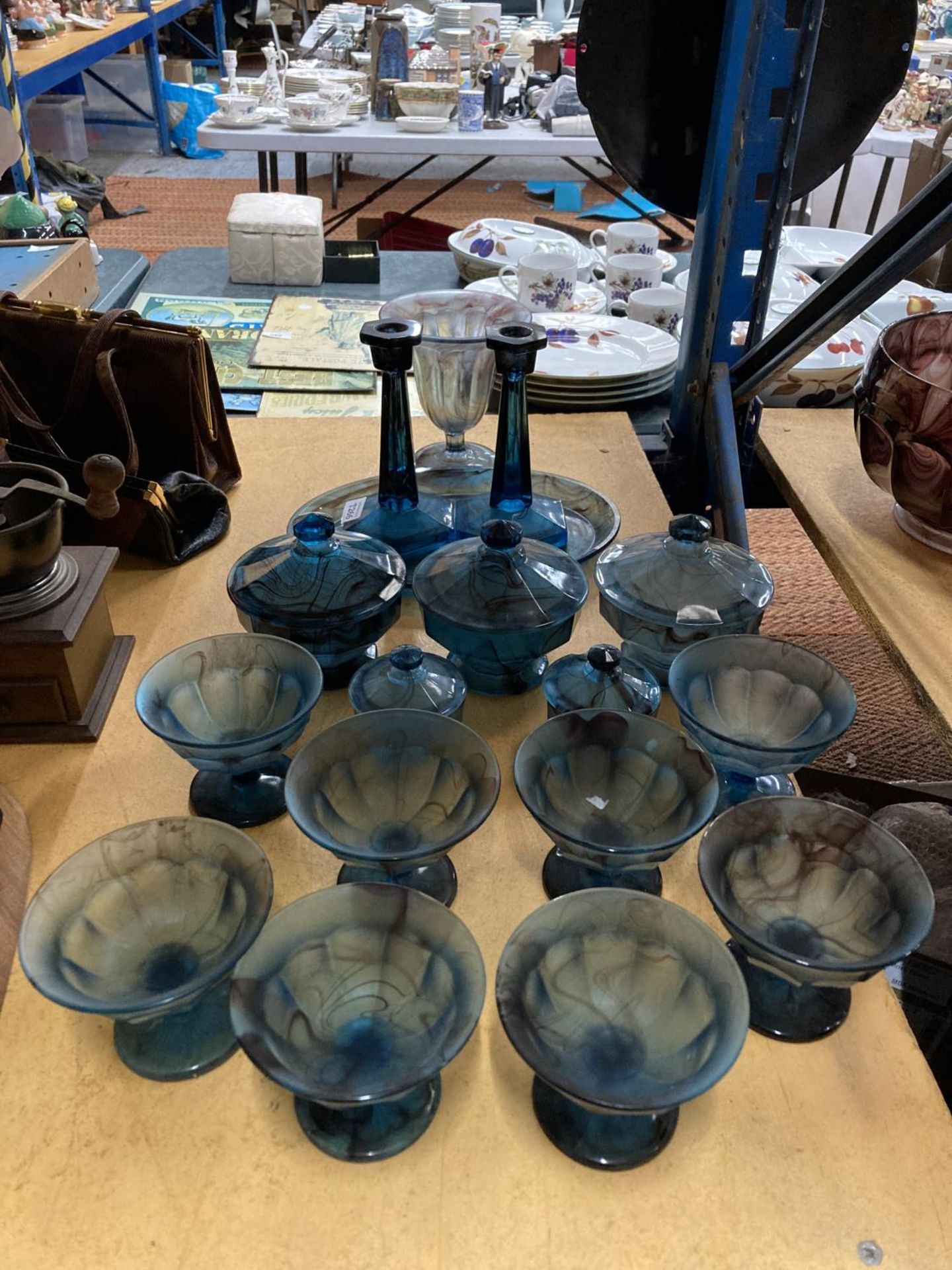 A LARGE QUANTITY OF BLUE CLOUD GLASSWARE TO INCLUDE DESSERT BOWLS, CANDLESTICKS, LIDDED BOWLS, ETC